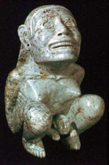 An artifact of the Aztec goddess Tlazoteol giving birth in the squatting position.