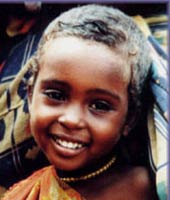 Young East African girl with full forehead and parted eyebrow